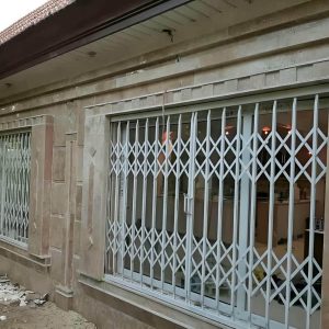 درب آکاردئونی حفاظ فلزی در سیرجان