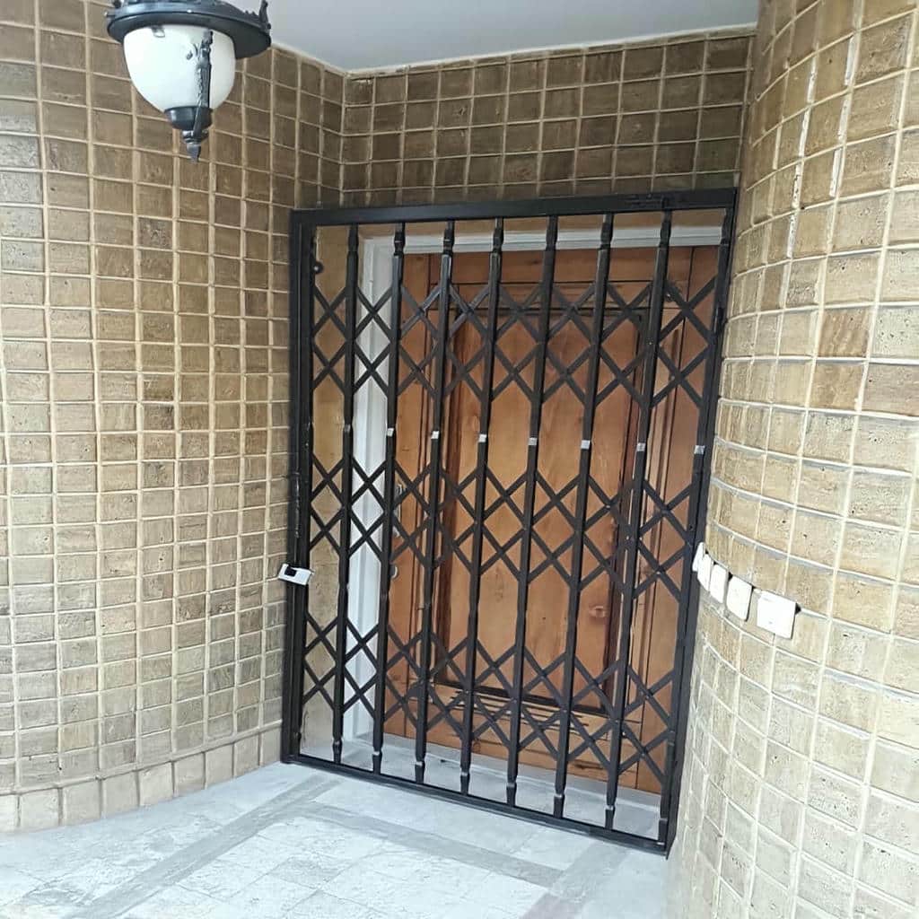 کارخانه درب آکاردئونی فلزی تقویت شده در بومهن