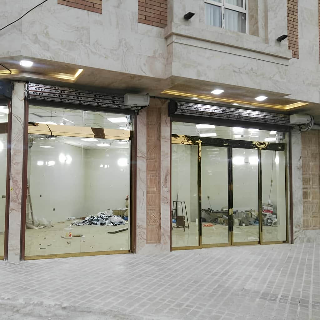 نصب درب شیشه‌ای سکوریت اتوماتیک ورودی تلسکوپی