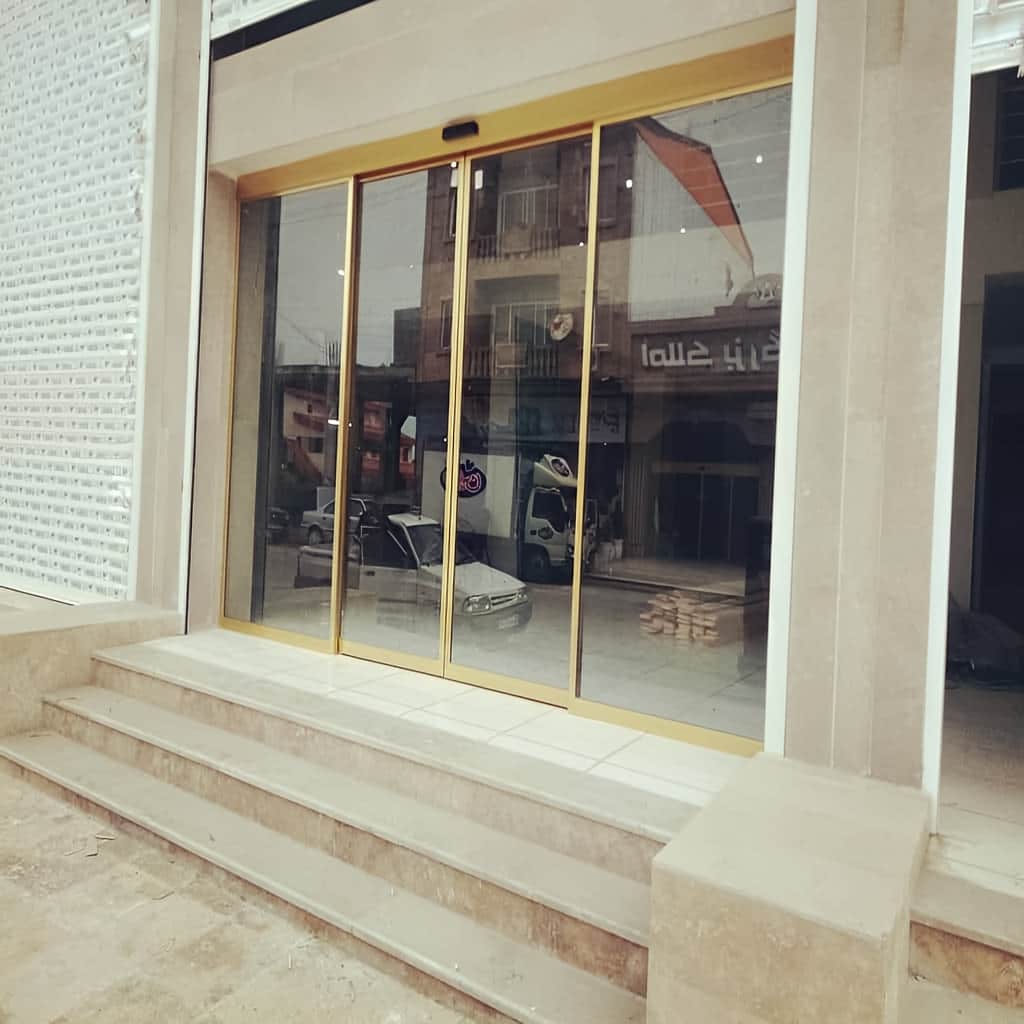 اجرای درب اتوماتیک شیشه‌ای هتل لابی مدل گردان