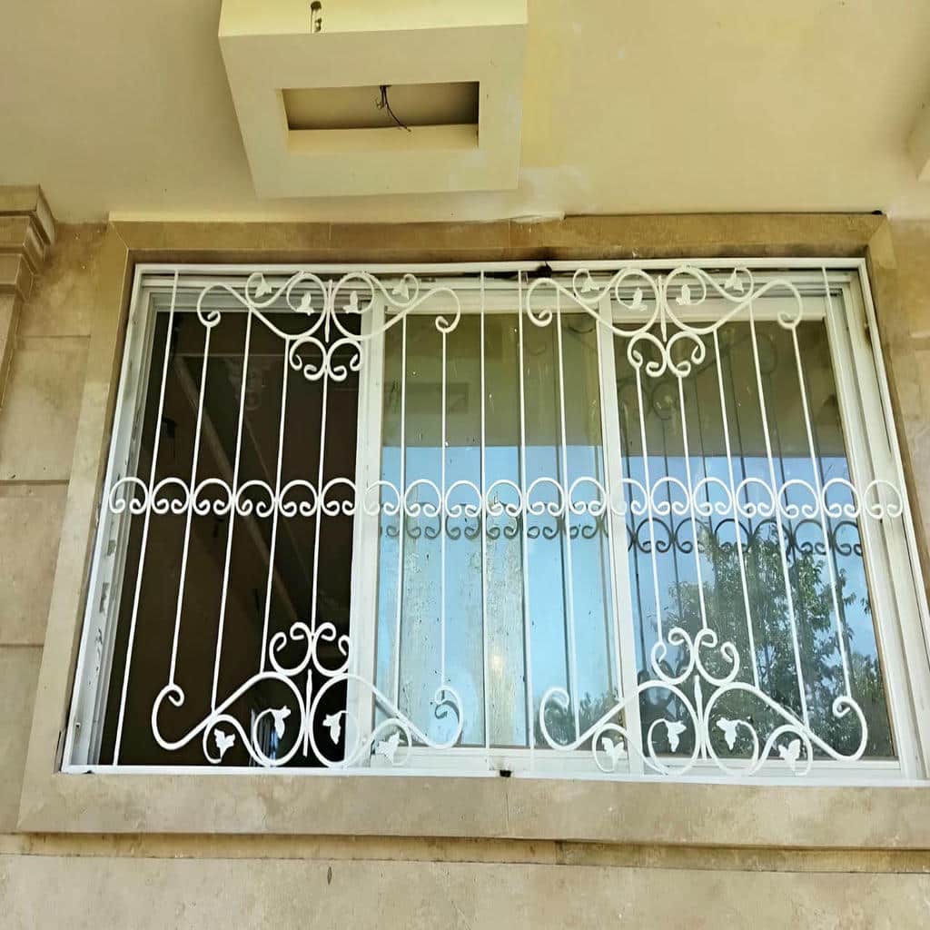 خرید آنلاین حفاظ پنجره فرفورژه گل نرده بازشو