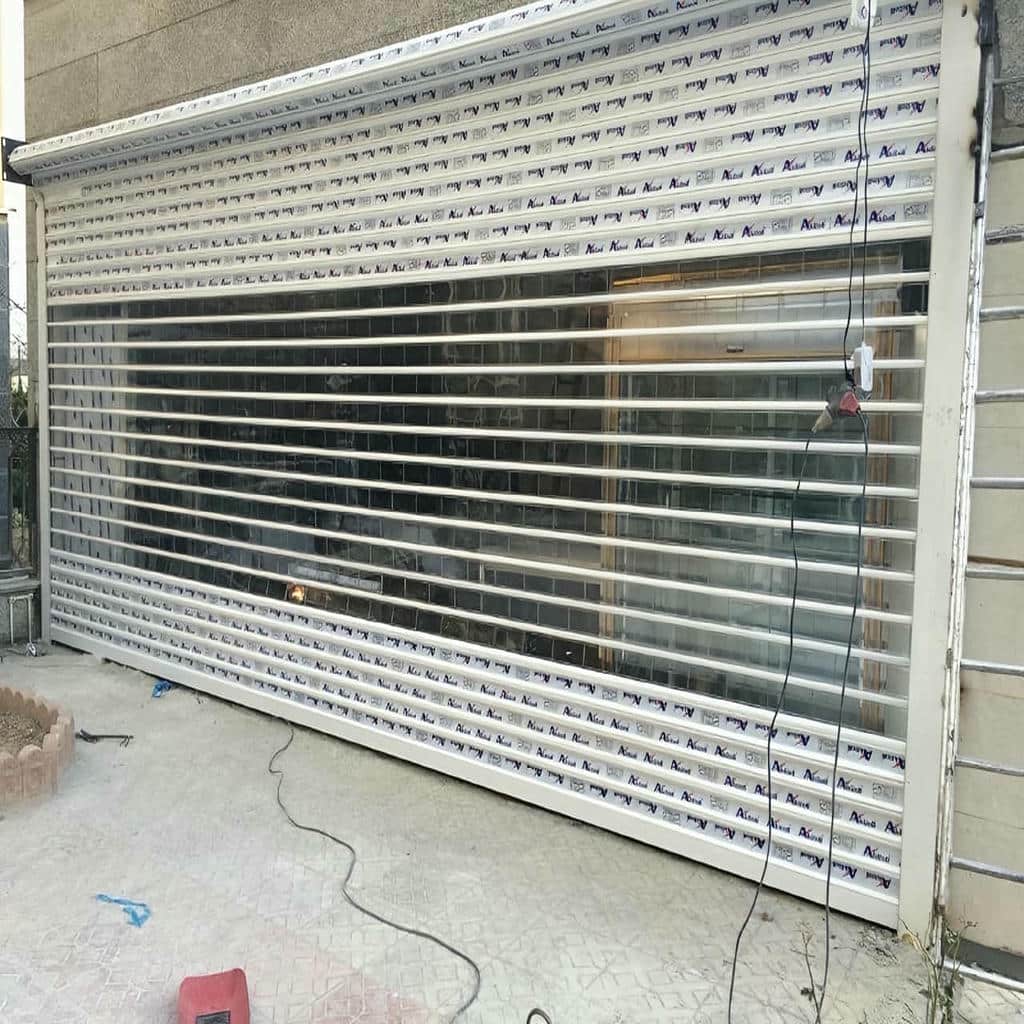 نصب درب کرکره ای پارکینگ اتوماتیک با ریل متناسب
